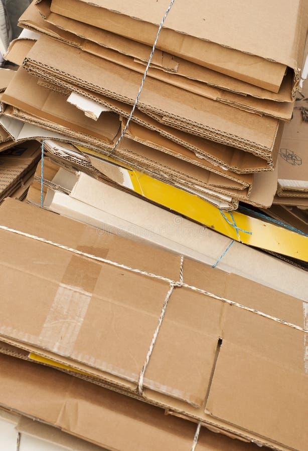 Old paperboard waiting for recycling. stock image
