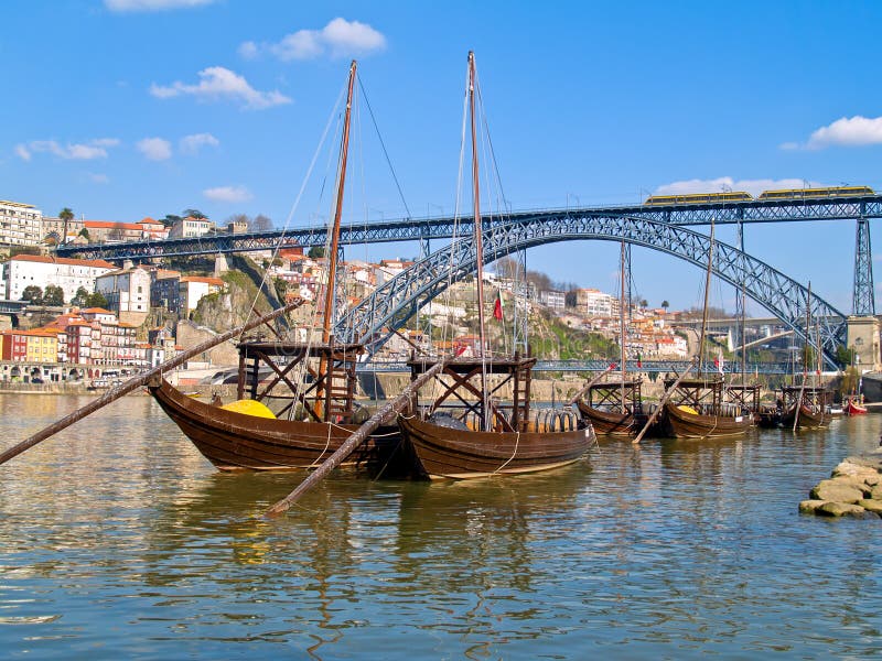 Old Porto and traditional boats with wine barrels stock image Old Porto and traditional boats with wine barrels stock image