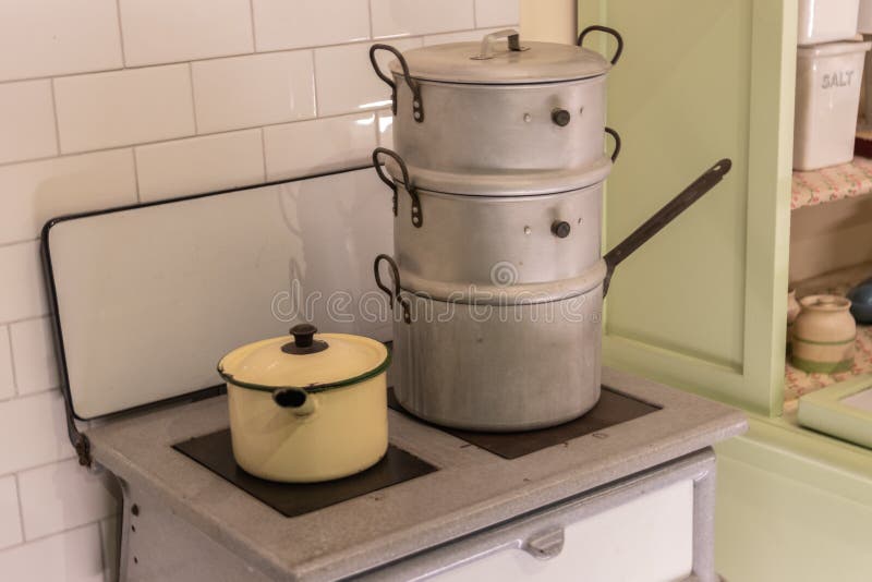 Vintage Pots and Pans Hanging on a Wall Stock Image Image of