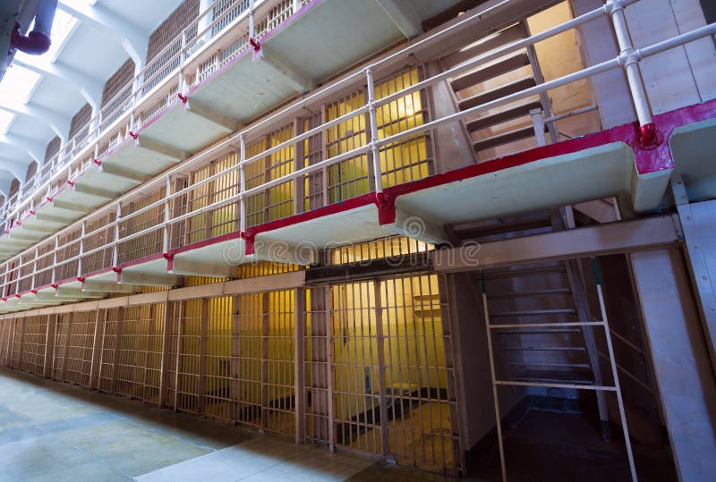 Several stories of prison cells in American prison with balcony and bars. Several stories of prison cells in American prison with balcony and bars