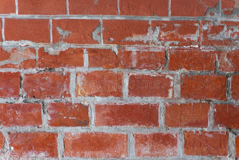 An Old Ragged Imitation of a Brick Wall. Red Brick, White Grout Stock