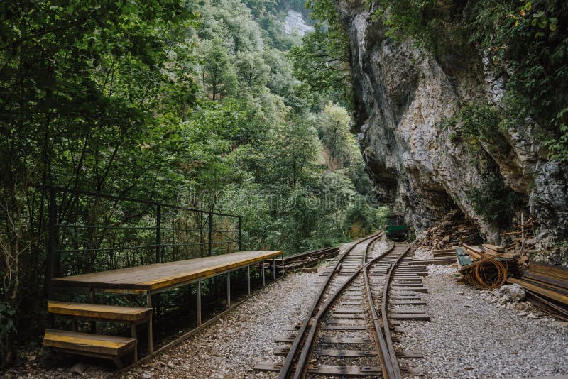 Old railroad or railway road in mountain landscape