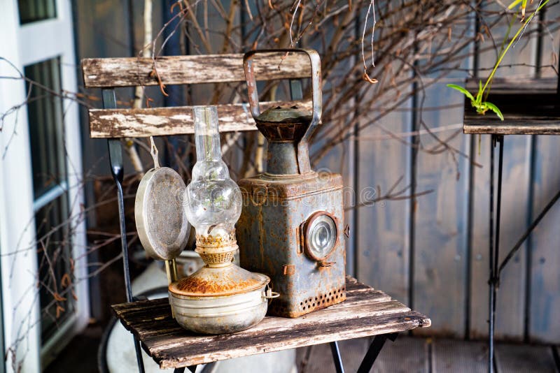 Old railway signal lantern and kerosene lamp. retro vintage objects for interior royalty free stock photo
