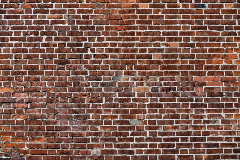 Old Red Brick Wall with Lots of Texture and Color.