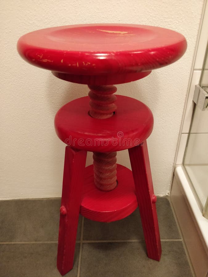 Old red chair in bathroom stock image. Image of chair 154127719