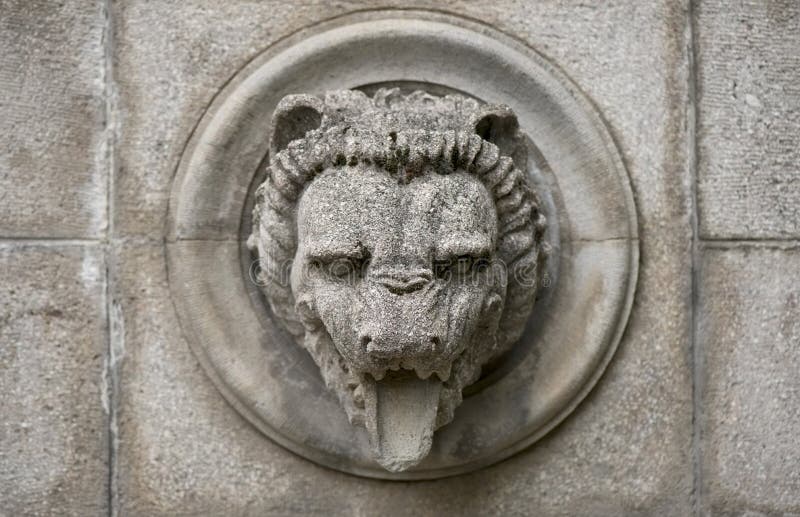 Old relief with lion head stock photo Old relief with lion head stock photo