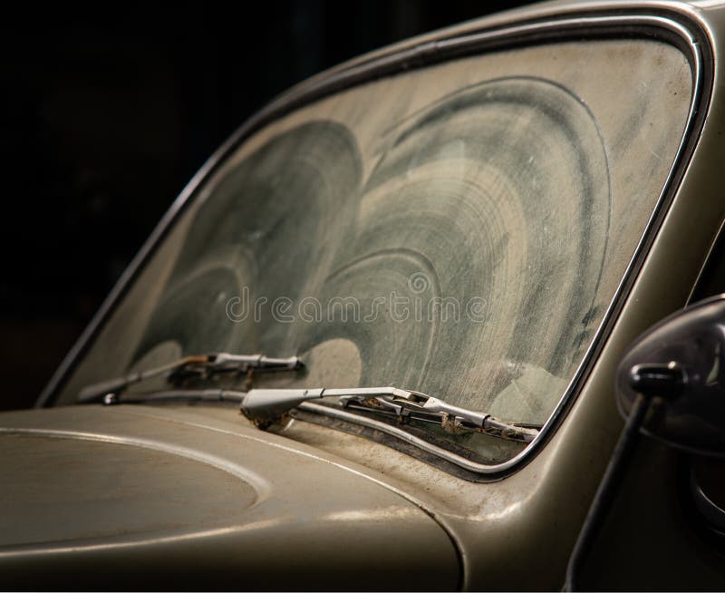 Old and retro brow car covered in dust in the garage. The old and retro brow car covered in dust in the garage royalty free stock images Old and retro brow car covered in dust in the garage. The old and retro brow car covered in dust in the garage royalty free stock images