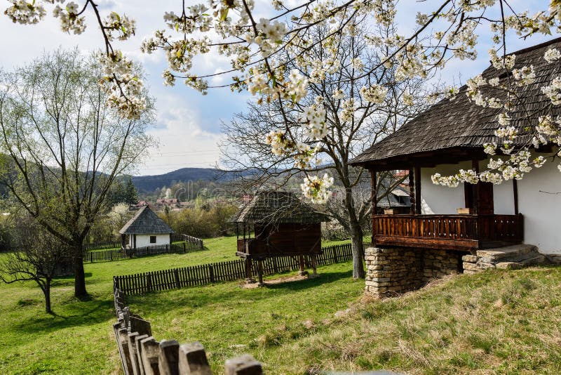 Old romanian peasant courtyard in Village Museum, Valcea, Romania