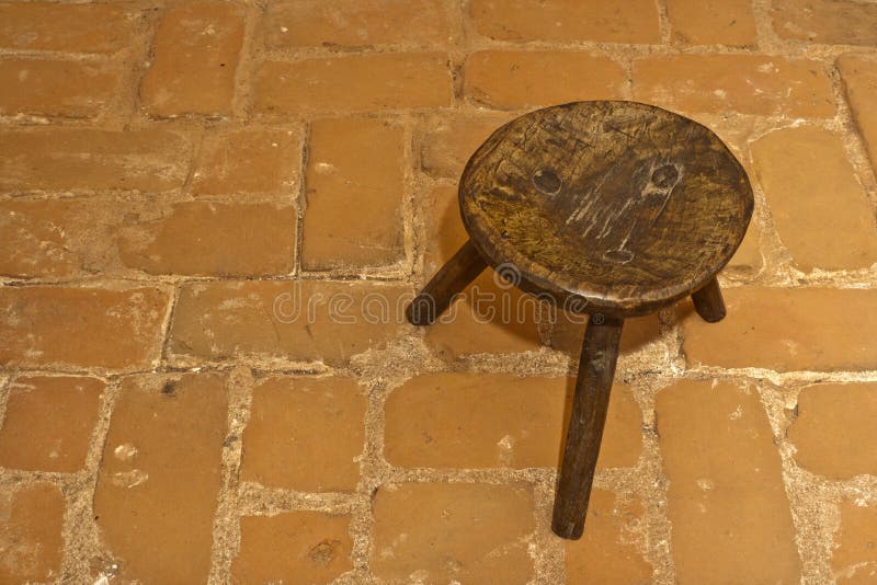 Old romanian traditional wooden stool stock photo