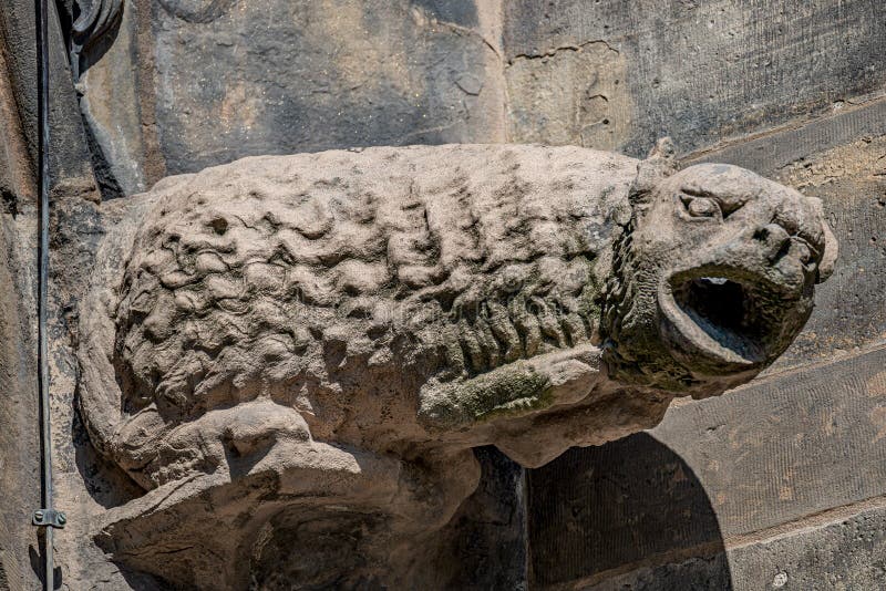 Old roof figures of scary gargoyles at main facade of cathedral in Magdeburg, Germany, closeup, details royalty free stock photo Old roof figures of scary gargoyles at main facade of cathedral in Magdeburg, Germany, closeup, details royalty free stock photo