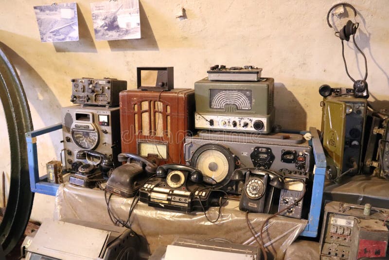 Old Rotary Phones, Radios and Radio Stations on the Table Stock Image