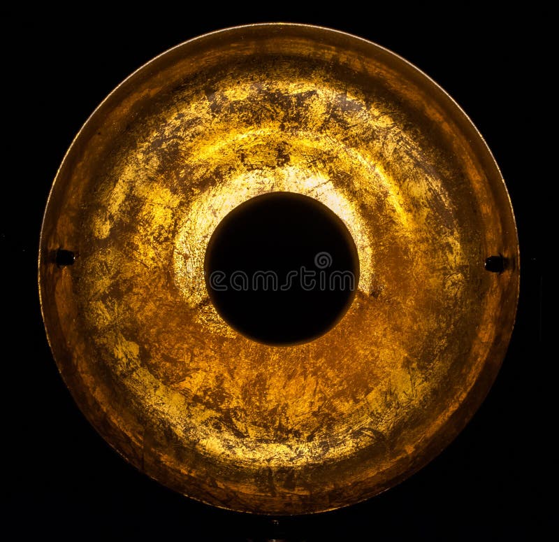 Old round gold object