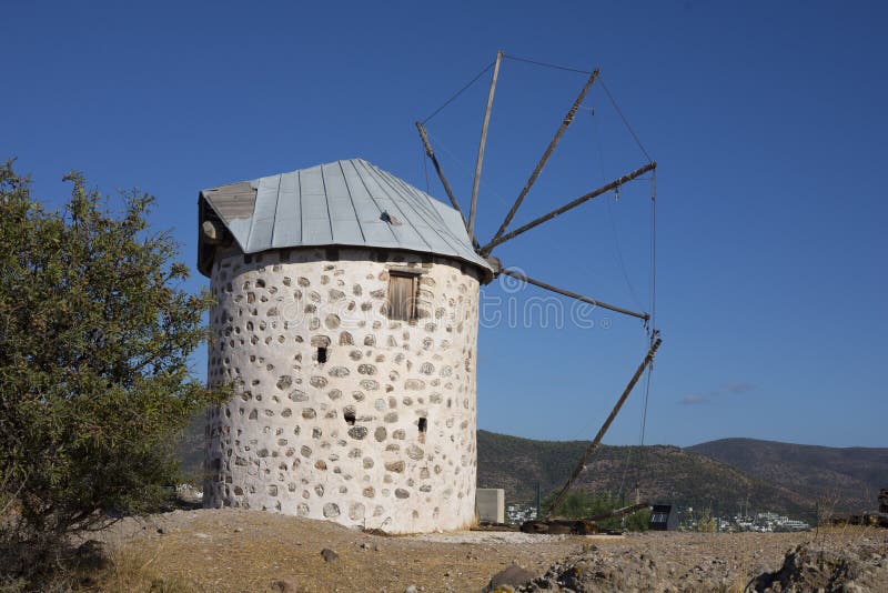 View on an old ruined greek windmill in Bodrum, Turkey. View on an old ruined greek windmill in Bodrum, Turkey