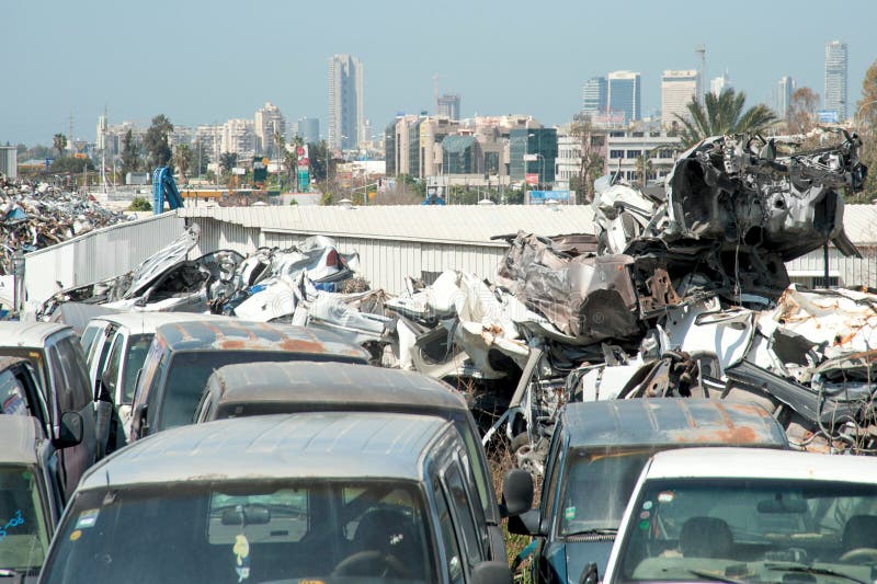 Old rusted cars in junk yard