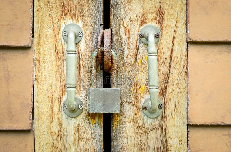 Old rusted lock on a wooden door royalty free stock image Old rusted lock on a wooden door royalty free stock image