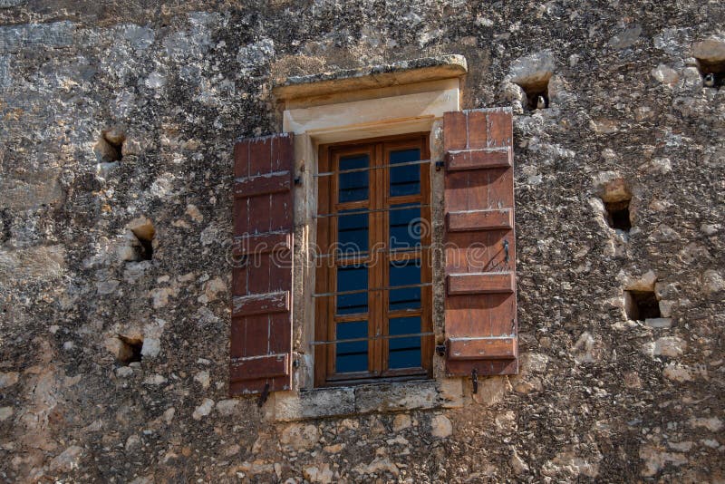 Old Rustic Window with Cooling Holes in the Masonry Stock Photo Image