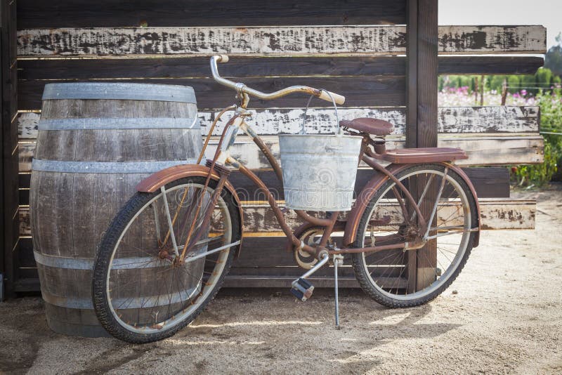 Old Rusty Antique Bicycle and Wine Barrel