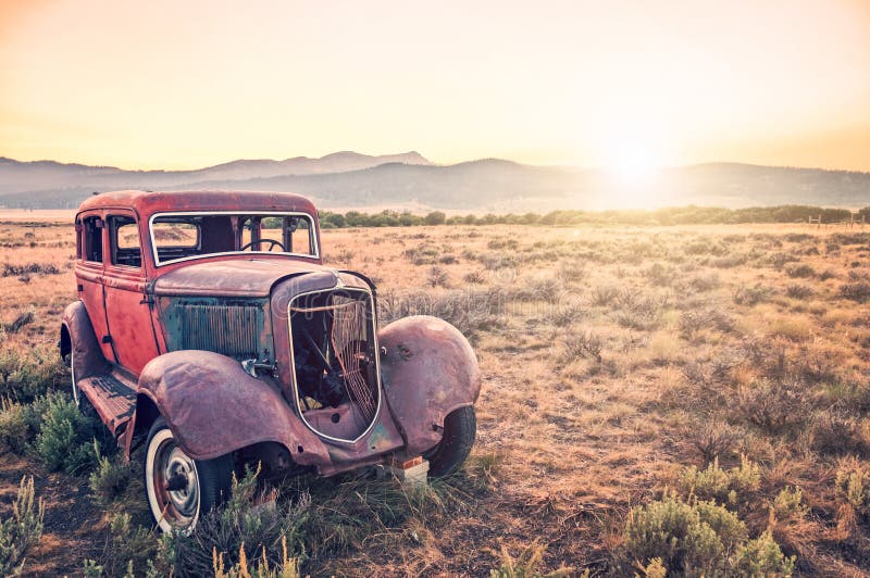  Old  Rusty Antique  Car  Abandoned In A Field  Stock Image 