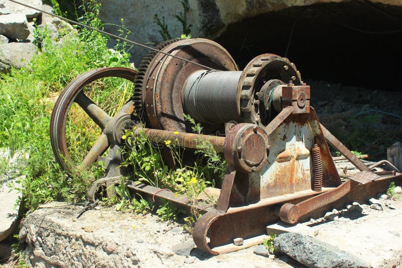 Old rusty cable winch stock image. Image of object, grass 74307963