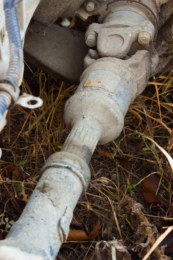 Old rusty chassis, the car with the gearbox, driveshaft, differential stock photography