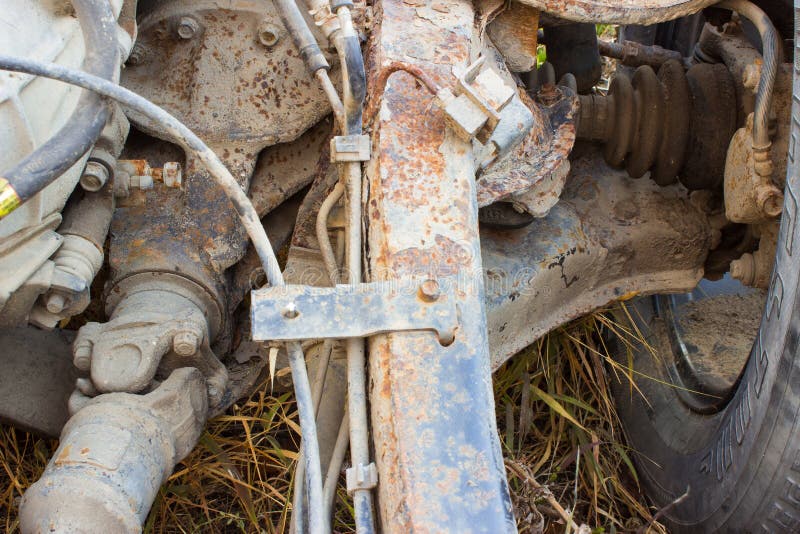 Old rusty chassis, the car with the gearbox, driveshaft, differential stock photo
