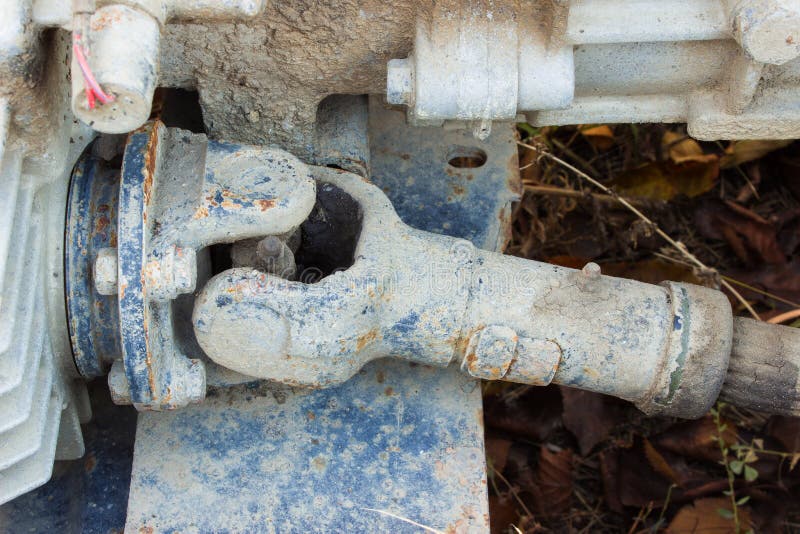 Old rusty chassis, the car with the gearbox, driveshaft, differential stock images