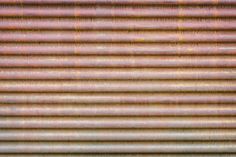 Old rusty corrugated metal sheet