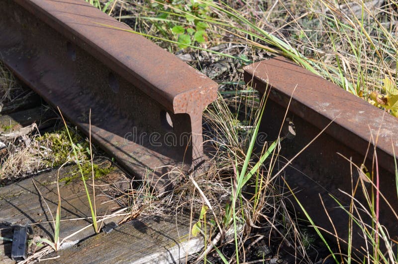 Old rusty disassembled railway rails stock photography