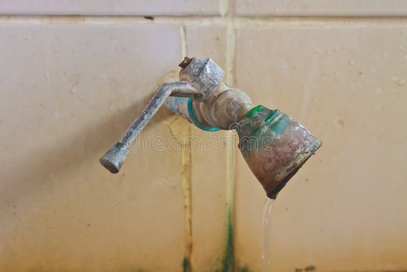 Old rusty faucet stock photo. Image of water, metal, construction