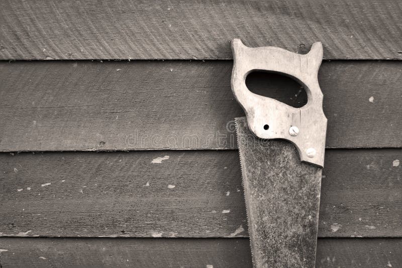 Old rusty hand saw royalty free stock photo