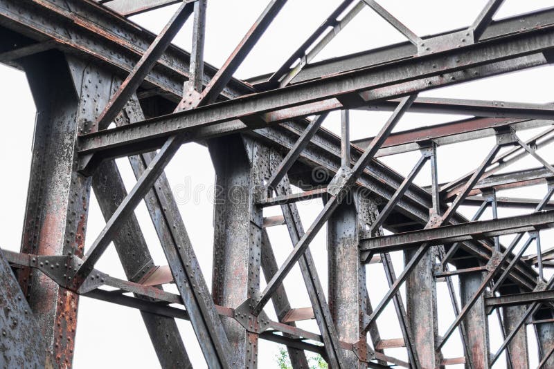 Old rusty steel bridge construction - rusted steel beams