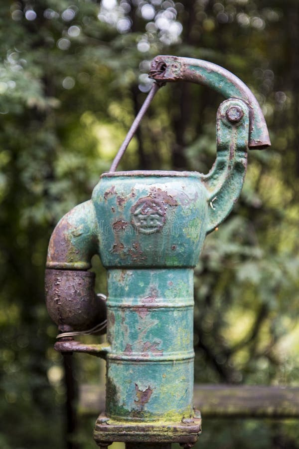 Old Rusty Water Pump in the Forest Stock Photo Image of container