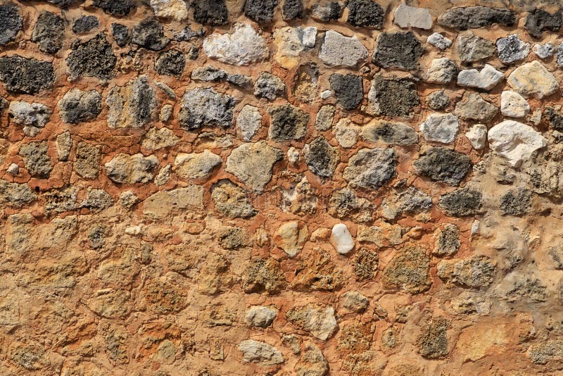 Old sandstone wall as background. Beautifully textured and weathered. royalty free stock photography Old sandstone wall as background. Beautifully textured and weathered. royalty free stock photography