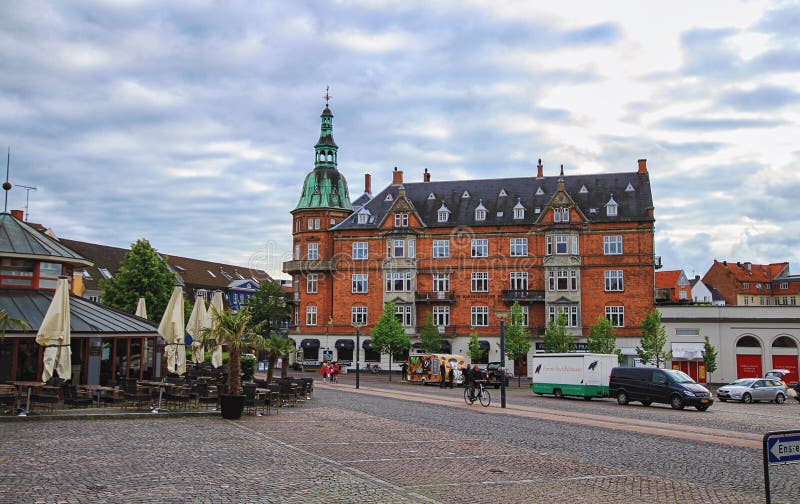 Old scandinavian house, restaurant and square of cobblestones near Frederiksborg castle