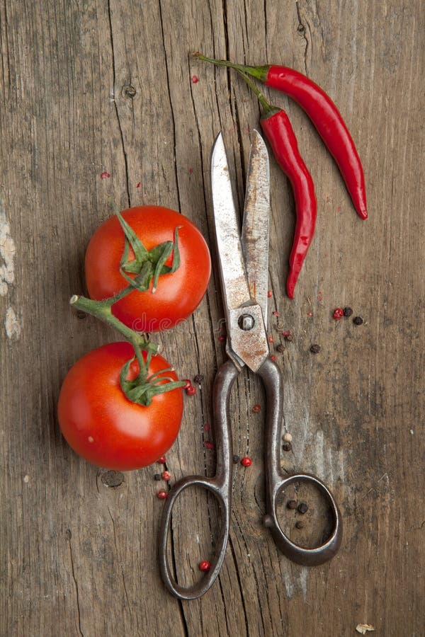 Old scissors and vegetables