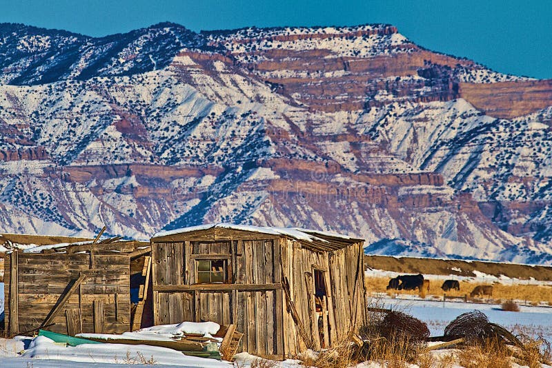 Old Shed and Snow Covered Bookcliffs