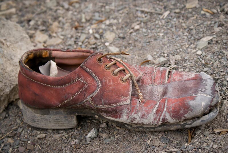 Old shoe left on a track