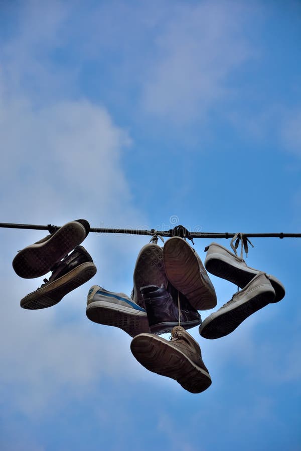 Old Shoes Hanging on a Wire Editorial Image - Image of gent, belgium ...