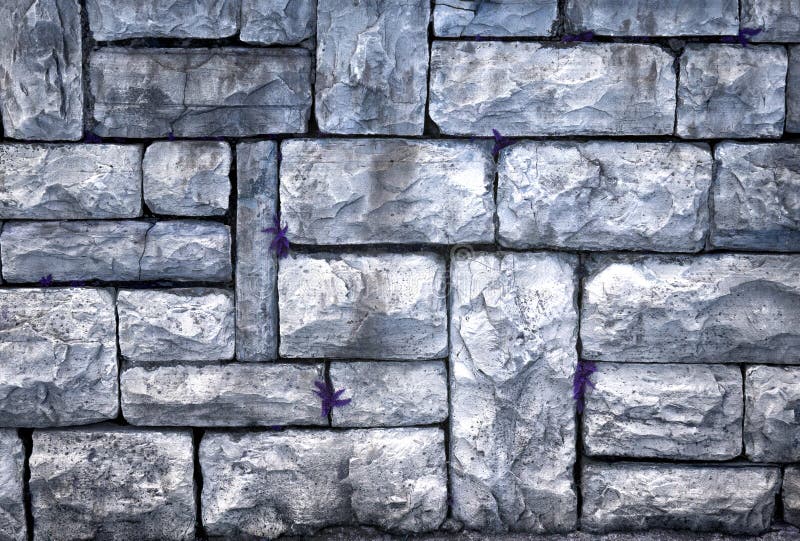 Old sidewalk made of gray rough stone stock photography