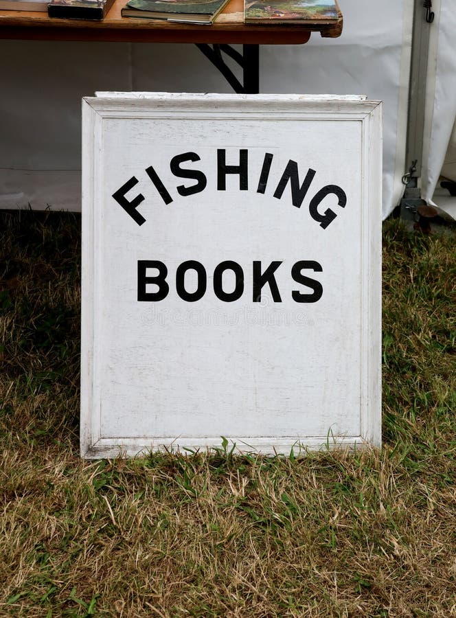 Old Sign at a Fishing Book Stall at a Country Show Stock Image
