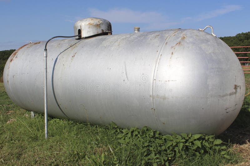 Old silver farm propane tank
