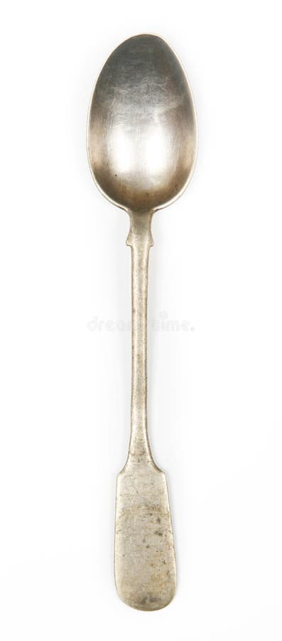 Old silver spoon on white background