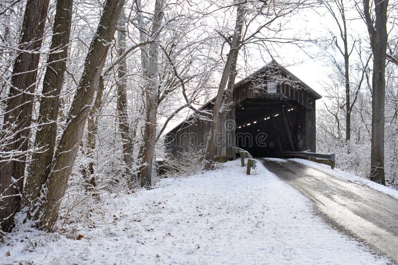 Old Snow Covered Wooden Bridge
