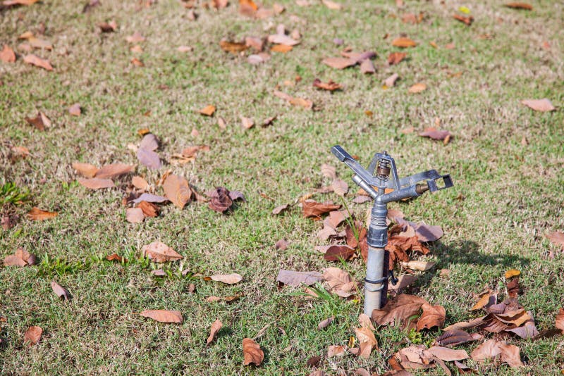Old sprinklers stock image. Image of water, drought, foliage 45967129