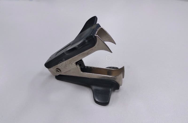 Old Staple Puller or Staple Remover Isolated on White Background. Stock  Photo - Image of equipment, damage: 249611876