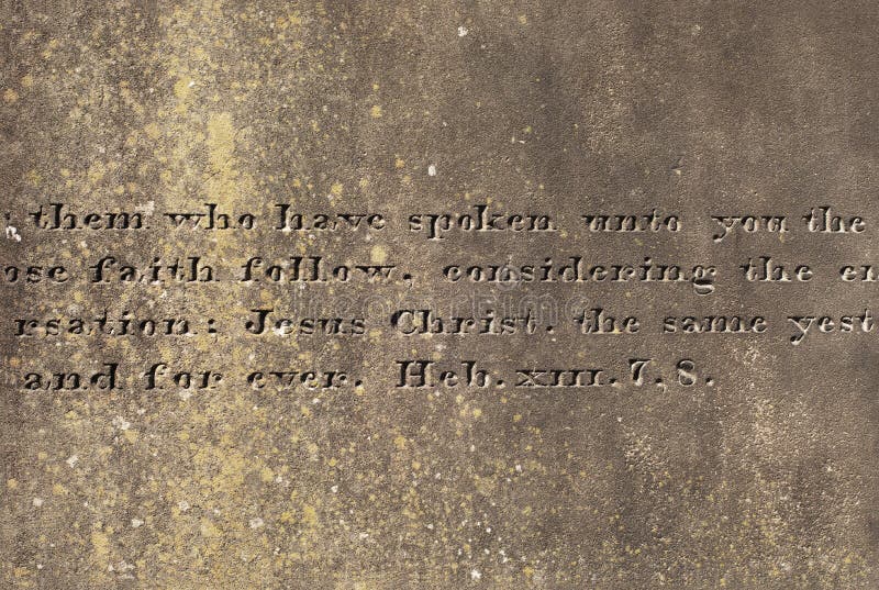 Old stone surface with the engraved words from Hebrews