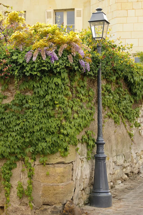 Old street lamp . Chinon. France