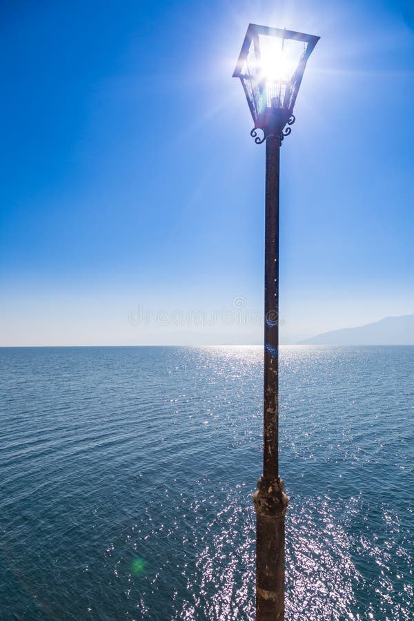 Old Street Lamp On The Beach Stock Image - Image of decoration, blue ...