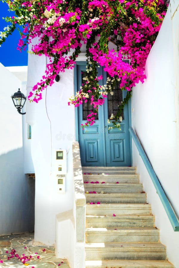 Charming floral streets in Mykonos,Cyclades, Greece stock photo Charming floral streets in Mykonos,Cyclades, Greece stock photo