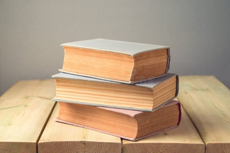 Old books on wooden table